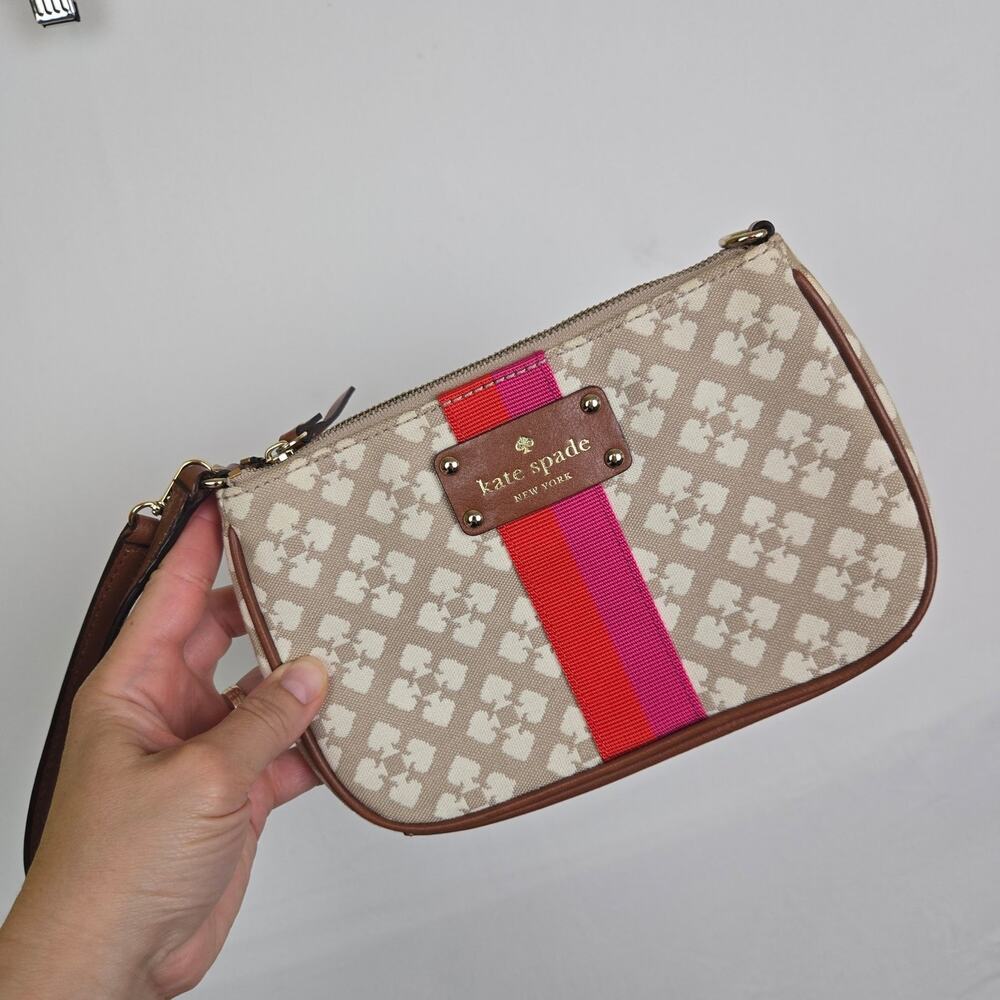 Kate Spade  wristlet mini bag signature pattern small central pink orange stripe